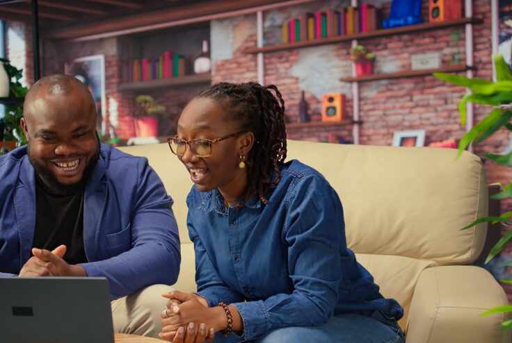 African ameircan people meeting with colleagues remotely on video call, discussing about tasks details and meeting on teleconference for a briefing. Man and woman chatting on web. Camera A.